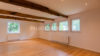 Obergeschosswohnung mit 4 Zimmern und Einbauküche in liebevoller Hofgemeinschaft - Wohnzimmer