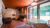Licht. Raum. Leben. - Stilvoller Bungalow mit großem Potenzial in exklusiver Lage von Paderborn - Kaminzimmer mit Essecke