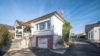 Interessantes Wohnhaus mit großzügigem Grundstück und Potenzial in Niederense - Hausansicht mitGarage